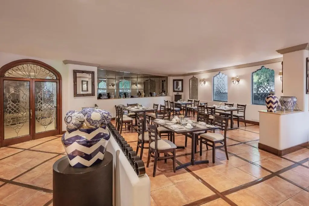 Hotel con restaurante gourmet en Puebla para temporada de chiles en nogada